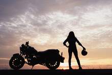 Silhouette Of Classic Motorcycle And A Girl Over Sunset,freedom