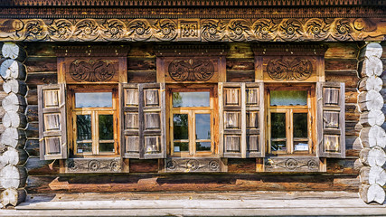 facade of an old wooden house in the museum of wooden architectu