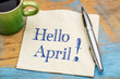 Hello April on napkin with coffee