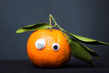 Wall Mural - Funny Tangerine With Eyes