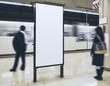 Blank Billboard Banner in Subway station with blurred people Commuter Travel concept