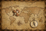 Fototapeta Mapy - Small wood airplane over world nautical map as travel and communication concept
