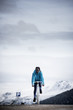 © Alberto Lessmann/ADDICTIVE STOCK - Woman cycling on white bike