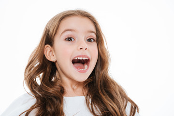 Cheerful charming little girl smiling and laughing