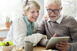 © Rawpixel.com - Senior Adult using Digital Device Tablet Concept
