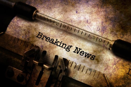 Breaking news text on typewriter