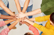 © Syda Productions - group of international people with hands together