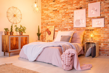 Wall Mural - Warm bedroom with brick wall