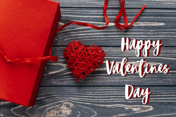 Wall Mural - happy valentines day text sign card concept. stylish red present