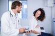 © WavebreakMediaMicro - Doctor interacting with pregnant woman