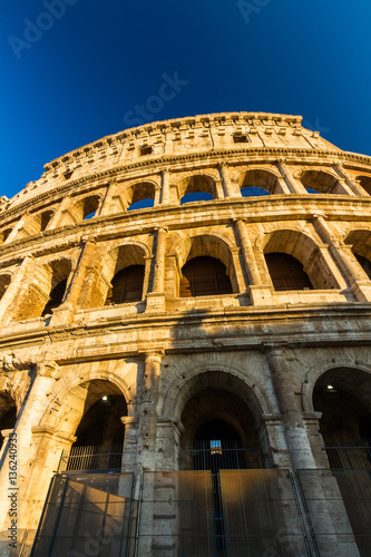 Fotografia, Obraz Colosseum or Coliseum Amphitheatre, evening in Rome.