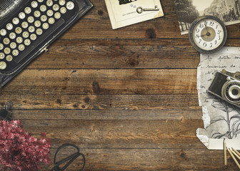 Good old times - vintage wood desk with creative retro items 