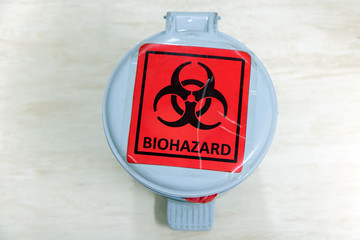 waste bin with biohazard sign