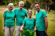 © WavebreakMediaMicro - Recycling team members standing in park