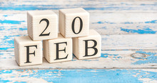 February 20th. Wooden Cubes With Date Of 20 February On Old Blue