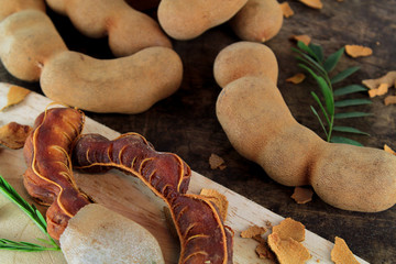 Wall Mural - fresh sweet ripe tamarind with leaf, healthy fruit