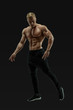 © USM Photography - Full-length shot of young man with muscular body