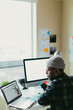 © ZeroThree - African American Man Working At His Desk