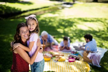 Wall Mural - Happy family enjoying in park