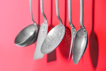 Canvas Print - Set of metal kitchen utensils hanging on wall