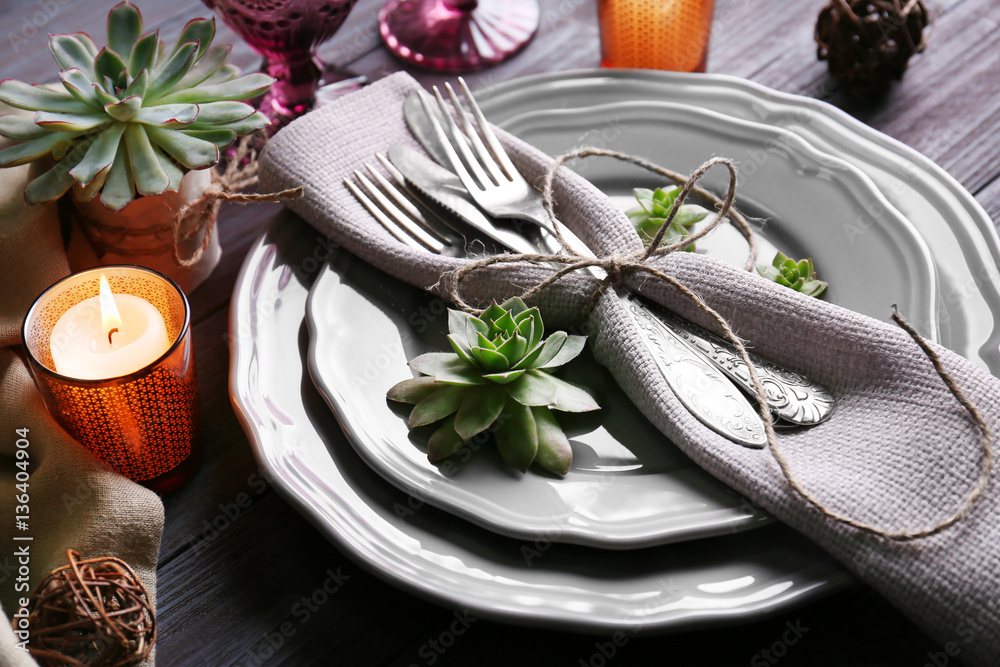 Table served with succulents on plate
