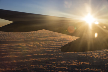 Wall Mural - sun rise from the airplane window 