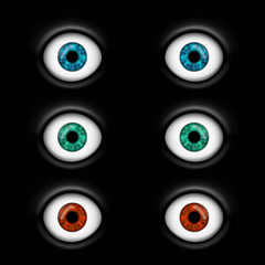 Set of human eyes with multicolored iris. Isolated on a black ba