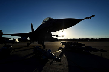 Canvas Print - Fighter aircraft with gear on runway