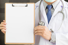 Medical Doctor Showing Blank Clipboard