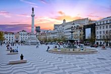 Rossio Square In Lisbon Portugal At Sunset