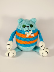 Knitted striped cat with white paws toy gift