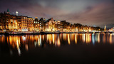 Fototapeta Paryż - Beautiful night in Amsterdam.  illumination of buildings an