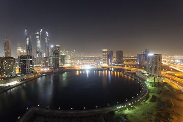 Fototapete - Dubai Business Bay at night