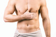 © mbruxelle - Muscular young man isolated on white background.