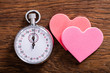 Speed Dating Concept. Hearts And A Stop Watch