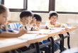 © Tom Wang - happy little girl student  in the classroom