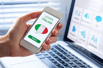 Learn Italian language online concept, mobile phone, flag of Italy