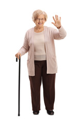 Sticker - Elderly woman with a walking cane waving