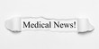 © magele-picture - Medical News! on white torn paper