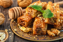 Traditional Arabic Dessert Baklava With Honey And Walnuts.