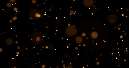 gold glow sparkle particles bokeh flowing effect on black background, holiday happy new year concept