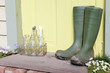© Tom - Green wellington boots sitting on doorstep