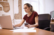© pablocalvog - Intelligent young business woman looking pensive