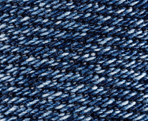 thread on jeans as a background. macro