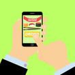 © Alyona - Finger presses order sushi button on smartphone