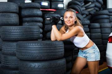 Sticker - Glad technician woman working in car workshop