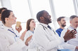 © Yakobchuk Olena - Happy therapeutics clapping hands during meeting