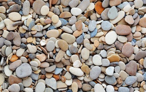 Obraz w ramie Pebbles on the beach texture or background.