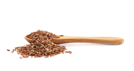 Wall Mural - Pile of brown rice grains isolated