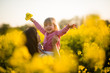 © Martinan - Carefree baby and mother on nature in rapeseed field